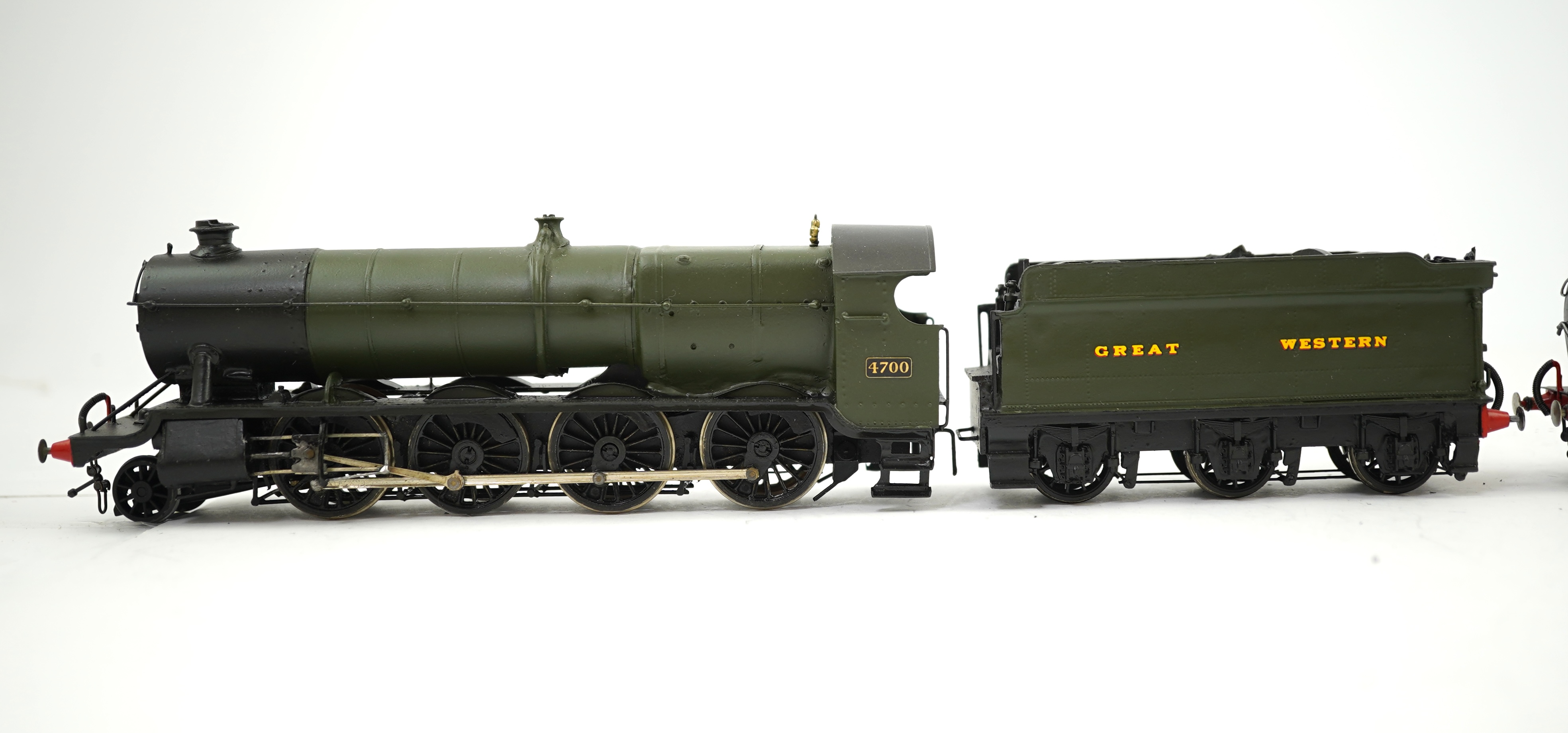 Two 00 gauge brass and white metal kit built GWR tender locomotives; a 4700 class 2-8-0, 4700, together with a Dean Barnum class 2-4-0, 3223, constructed, painted and lined to a high standard, both motored for two rail o